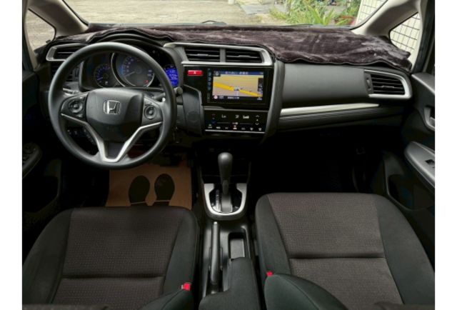 Honda FIT 1.5 白色/2016年式/認證原鈑件/年跑僅5千公里/藍芽導航主機/加裝原廠行車記錄器/原廠LED日行燈/定速/恆溫/換檔快撥/  第9張相片