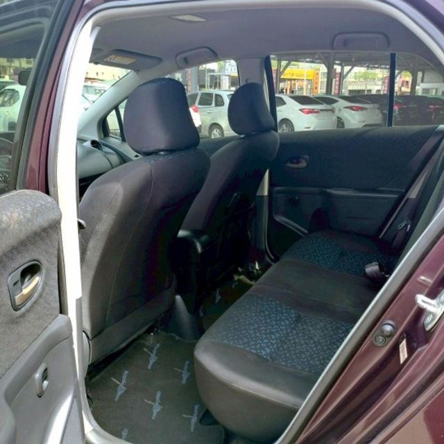 2010年 豐田 YARIS 紫 1.5 後霧燈/方向盤快控鍵/倒車雷達/電動後視鏡/後視鏡指示燈/頭燈水平調整  第6張相片