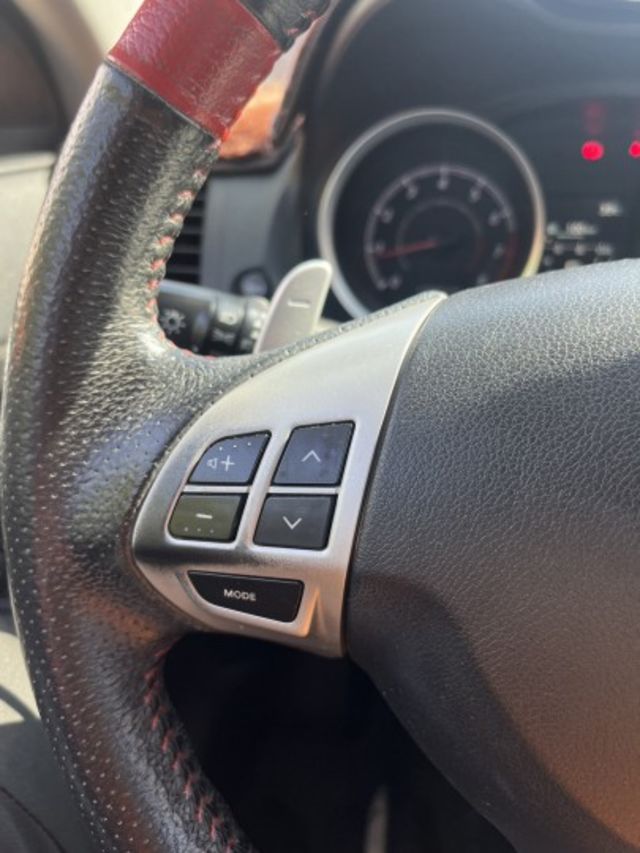2014 中華三菱 Fortis 勁動版 灰色 1.8 認證車 里程保證 雙前座跑車座椅 天窗 換檔撥片 定速 大螢幕  第4張相片