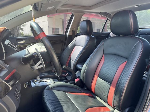 2014 中華三菱 Fortis 勁動版 灰色 1.8 認證車 里程保證 雙前座跑車座椅 天窗 換檔撥片 定速 大螢幕  第10張相片