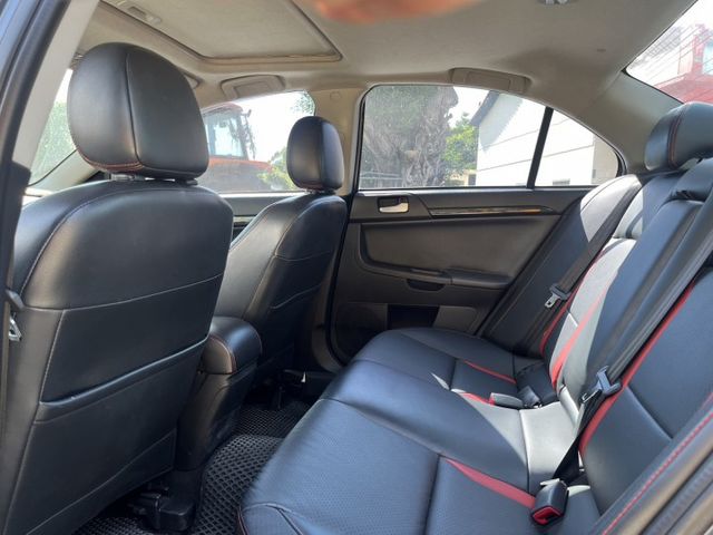 2014 中華三菱 Fortis 勁動版 灰色 1.8 認證車 里程保證 雙前座跑車座椅 天窗 換檔撥片 定速 大螢幕  第11張相片
