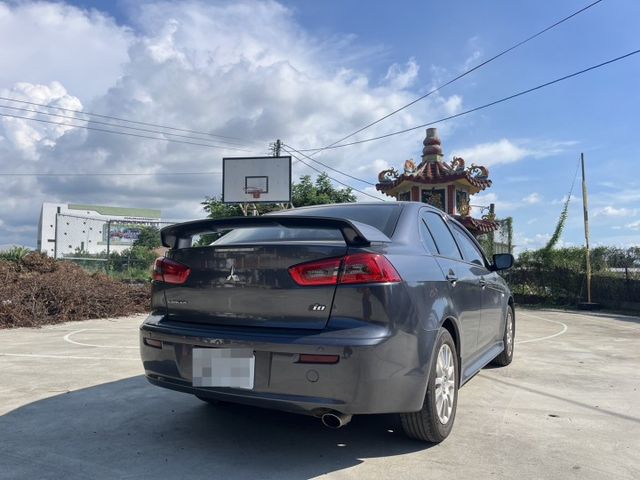 2014 中華三菱 Fortis 勁動版 灰色 1.8 認證車 里程保證 雙前座跑車座椅 天窗 換檔撥片 定速 大螢幕  第12張相片