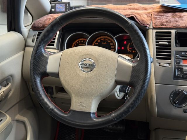 2014 日產 Tiida 黑色 1.6 四門 傳奇版 認證車 里程保證 實車實價 好車推薦  第9張相片