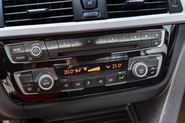 2015年318D 外觀靚麗 倒車顯像 HID頭燈 8速手自排 衛星導航 電動椅 I-KEY 不用殺價就很便宜  第15張相片