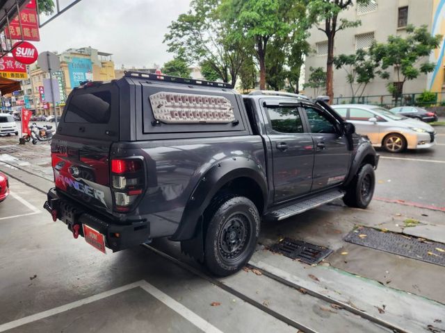 ♞Ranger 4x4 3.2柴油 里程僅跑5.6萬公里♞車主20幾萬改裝 輪框寬體+後廂+防撞桿+探照燈+底盤+導航♞  第3張相片