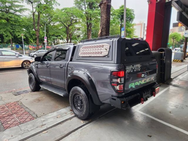 ♞Ranger 4x4 3.2柴油 里程僅跑5.6萬公里♞車主20幾萬改裝 輪框寬體+後廂+防撞桿+探照燈+底盤+導航♞  第4張相片