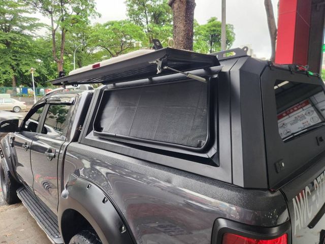 ♞Ranger 4x4 3.2柴油 里程僅跑5.6萬公里♞車主20幾萬改裝 輪框寬體+後廂+防撞桿+探照燈+底盤+導航♞  第12張相片