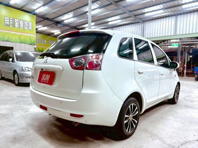 2013年Mitsubishi Colt Plus 1.6 白色經典款  第5張相片
