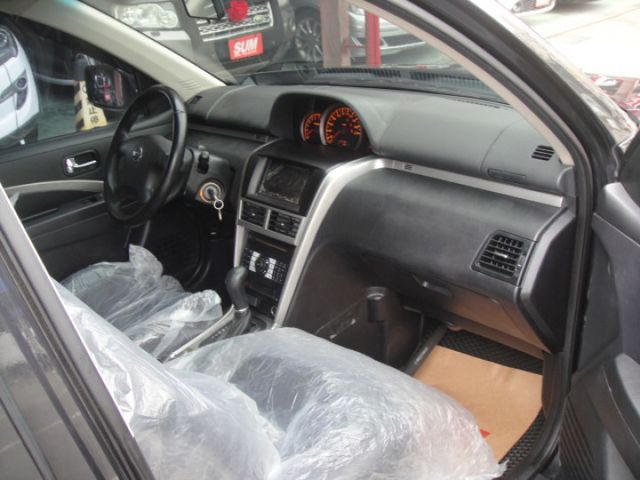 06 X-Trail 2.0 黑/黑~天窗頂級型.黑內裝.車車極省油極美!  第12張相片