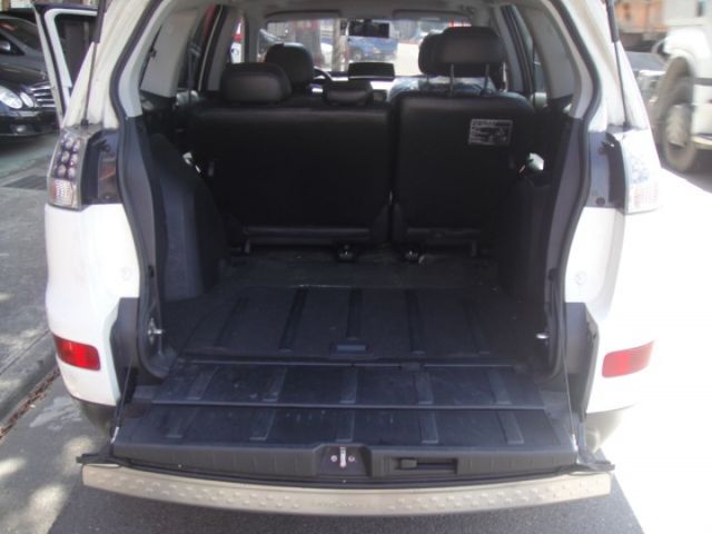 11 Outlander 2.4 2WD 豪華型~白.很省油.車極美--好開!  第9張相片