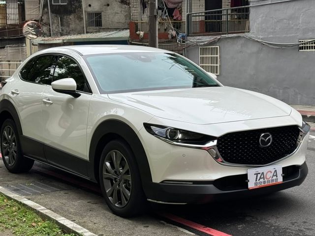 Mazda  CX-30 金鑽店~馬自達CX-30 旗艦進化版2.0 新車價109.9萬 有BOSE音響，電動尾門，電動座椅，黑化特仕版鋼圈，360度環景，7安，盲點，ACC跟車，KEY  第1張相片