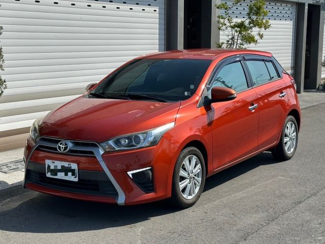 2014 Toyota Yaris 歐戀橘 僅跑10.8萬、原版件、無泡水 重點配備：安卓機、倒車顯影  第1張相片