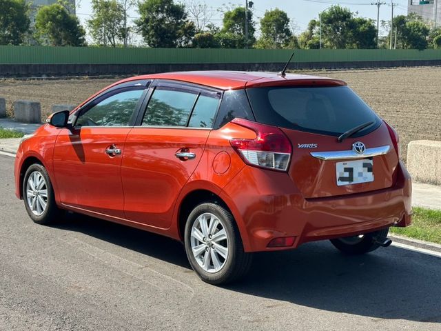 2014 Toyota Yaris 璀璨橘 僅跑10.6萬保證里程、無重大事故、無泡水  第3張相片