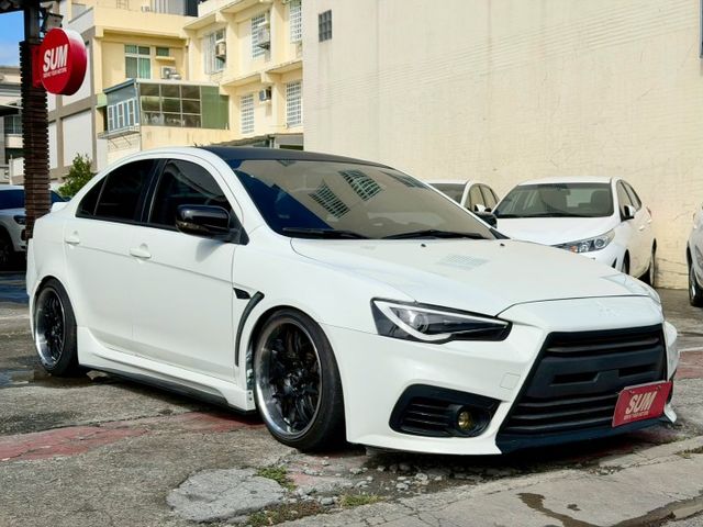 2015 Mitsubishi Lancer iO 1.8勁動型 方向盤快控鍵 換檔撥片 空力套件 定速巡航  第1張相片