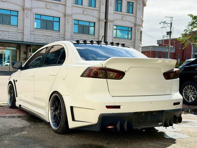 2015 Mitsubishi Lancer iO 1.8勁動型 方向盤快控鍵 換檔撥片 空力套件 定速巡航  第2張相片