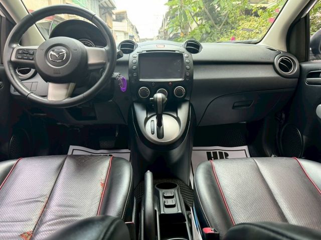 2013 Mazda 2 1.5  方向盤快控鍵 CD音響主機 電動摺疊後視鏡  第7張相片