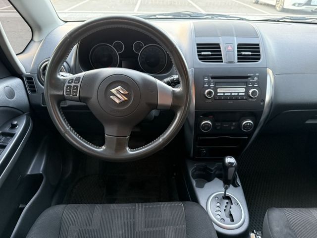 2010 Suzuki SX4 白色 原鈑件 原廠保養 優質代步車 不用出價 就能很便宜  第12張相片