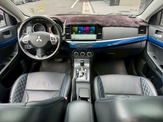 Lancer io 定速系統 安卓機 天窗 倒車顯影 倒車雷達  快控方向盤 恆溫空調 17寸鋁圈  第3張相片
