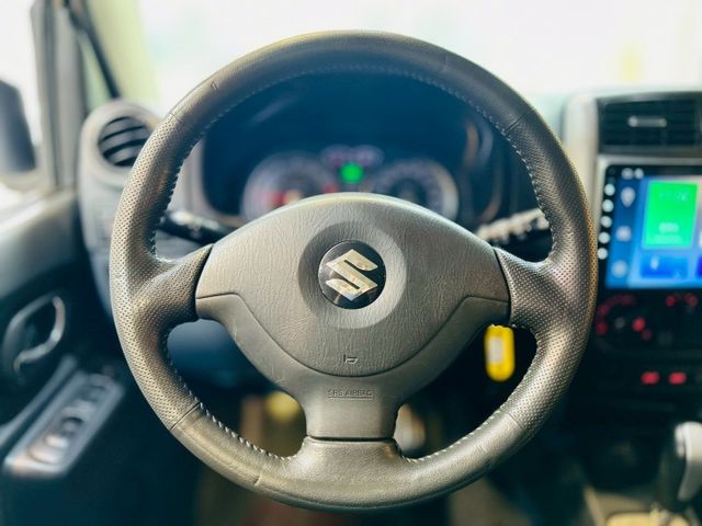 只跑10萬 日本原裝四輪傳動 越野小休旅 1.3CC 倒車顯影 導航 電動後視鏡  第14張相片