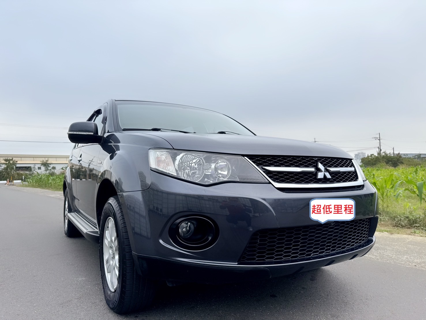 2011年 三菱 OUTLANDER 休旅車  超低里程~年均里程6800公里~經典車款~妥善率高~動力極佳~上下對開尾門+後座可摺疊收納彈性~CP值最高的SUV車型~休旅車首選~  第2張相片