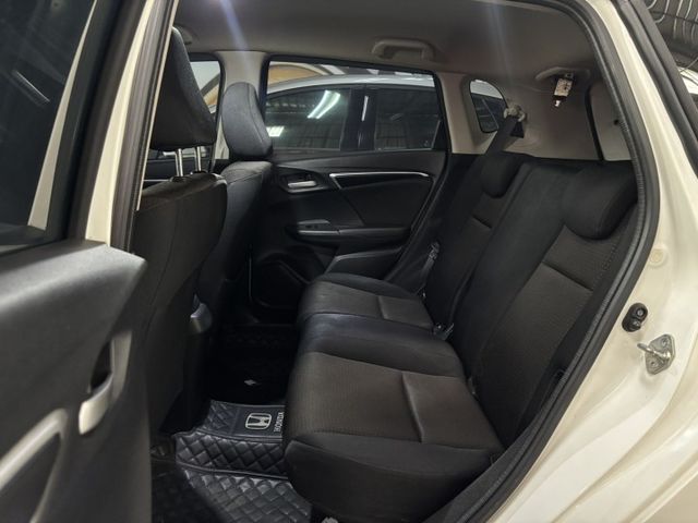 2014 HONDA FIT S版 里程23.7萬公里 車況不錯‼️  換檔撥片 倒車顯影 恆溫空調 電折後視鏡 定速巡  第7張相片