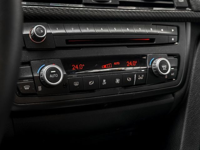 一鍵啟動/雙區恆溫空調/電動記憶座椅/電子排檔桿/自動光感應頭燈/改裝M3方向盤/改裝龍麟尾燈  第11張相片