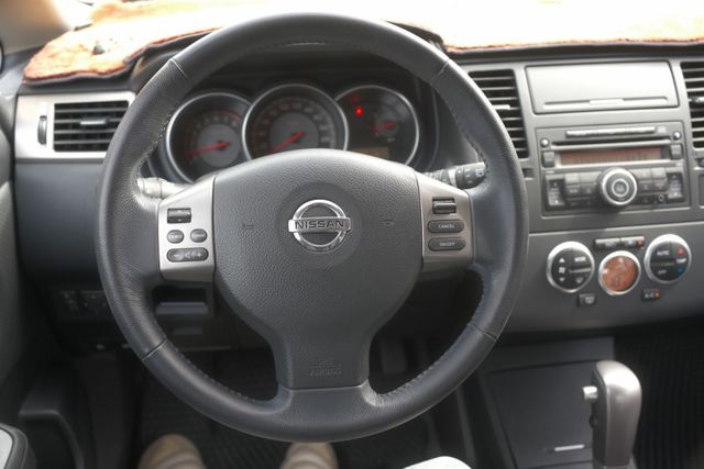 2011 Nissan Tiida 5D 1.8 L  定速 IKEY 倒車雷達 恆溫空調 里程保證僅5.2萬  第10張相片