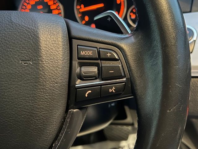 總代理/原鈑件/倒車影像/雙區恆溫空調/真皮跑車方向盤/換擋撥片/皮椅/雙前座電動座椅/IDRIVE控制系統  第12張相片