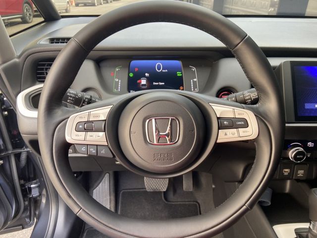 2024 油電FIT 標榜最省油 配備超滿 有升級原廠大包套件 不用殺價就很便宜 類新車 跑超級少  第4張相片